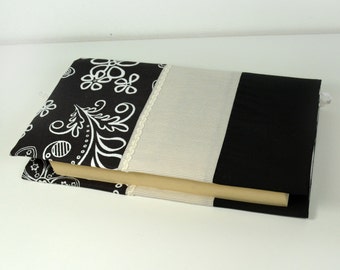 Fabric notebook cover in black and white.