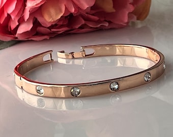 Gold bangle hinged diamante curved panel modern