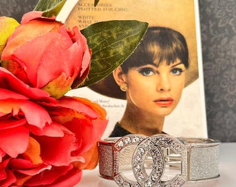 Silver bangle vintage  hinged  Sparkling logo