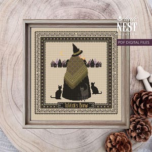 May include: Cross-stitch design featuring a witch with a black hat and shawl, surrounded by black cats and small houses. The text "Witch's Brew" is below the image. The design is framed in a wooden frame and includes the text "PDF DIGITAL FILES".