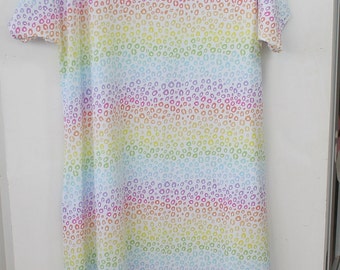 Nightdress for an adult. Fit large. Wide neck, cotton rich, medium weight jersey, suitable hospital wear. Rainbow leopard print on white