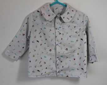 Vintage style shirt for a one year old in British Lewis and Irene designed fabric called Jolly Spring. Gift idea.