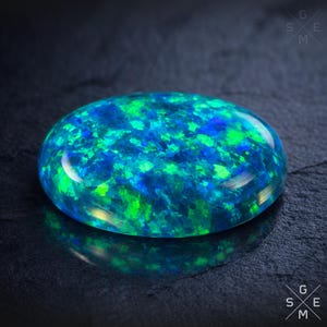 Türkis Opal Edelstein Oval Cabochon Blau Grün Feuer Blitz für Schmuckherstellung 10 x 14 mm.