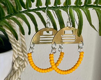 Brass half circle earrings with yellow glass beads