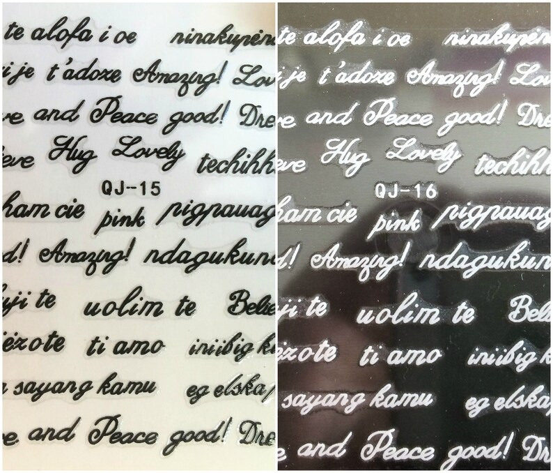 May include: Two sheets of clear sticker paper with black lettering. The stickers feature phrases in multiple languages, including "Amazing!" and "Peace good!" The sheets are labeled "QJ-15" and "QJ-16".