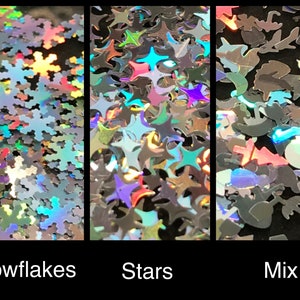 May include: Three close-up images of iridescent glitter. The first image shows snowflakes, the second image shows stars, and the third image shows a mix of snowflakes, stars, and other shapes.