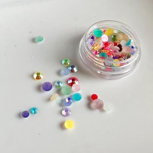 100 Uds. Strass de resina para decoración de uñas, piedras de diamantes de imitación de cristal AB, manicura 3D, amuletos de esmalte de Gel UV