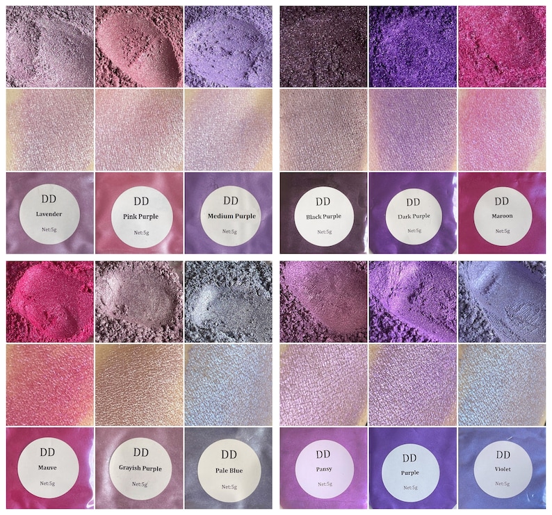 May include: A collection of 12 small jars of purple, pink, and blue mica powder. Each jar has a white label with the name of the color and "DD" printed on it. The jars are arranged in a grid of four rows and three columns.