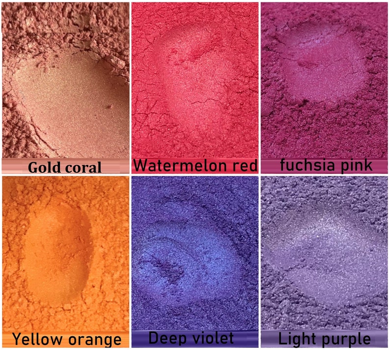 May include: Six small containers of loose pigment powder in various colours, including gold coral, watermelon red, fuchsia pink, yellow orange, deep violet, and light purple.