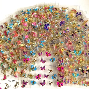 May include: A set of 24 sheets of clear adhesive backed butterfly stickers. The butterflies are in various colors, including pink, blue, purple, and gold. The stickers are perfect for adding a touch of whimsy to crafts, scrapbooking, and more.
