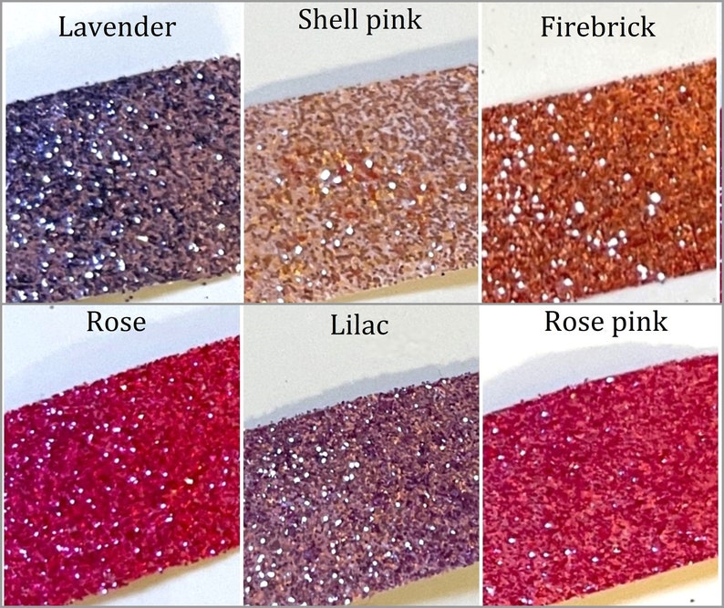 May include: Six small jars of glitter, each with a different color. The colors are lavender, shell pink, firebrick, rose, lilac, and rose pink.