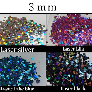 Pu&ograve; includere: Quattro mucchietti di glitter laser da 3 mm in argento, lilla, blu lago e nero.