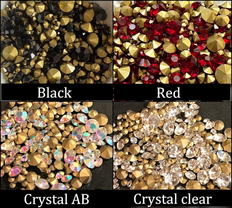 May include: Four close-up images of different colored rhinestones. The first image shows black rhinestones with gold accents. The second image shows red rhinestones with gold accents. The third image shows iridescent rhinestones with gold accents. The fourth image shows clear rhinestones with gold accents.