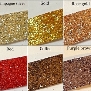 May include: Six samples of glitter in different colors: champagne silver, gold, rose gold, red, coffee, and purple brown.