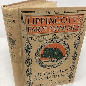 May include: A tan hardcover book titled Lippincott's Farm Manuals: Productive Orcharding by Fred C. Sears, M.S. The front cover features a dark green illustration of a tree inside an orange oval, surrounded by a decorative wreath and black text.