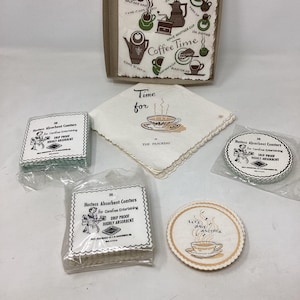 May include: A set of 20 white paper coasters with a brown and black coffee cup design. The coasters are packaged in plastic and have the text "Hostess Absorbent Coasters" and "Drip Proof, Highly Absorbent".
