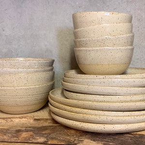 Made to order 16 piece speckled satin dinnerware collection