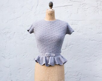 Vintage 1950s boucle peplum sweater