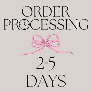 May include: A light gray graphic featuring the black text ORDER PROCESSING with a clock icon replacing the letter O. Below this is a pink ribbon illustration, followed by the black text 2-5 DAYS centered on the page in a clean font.
