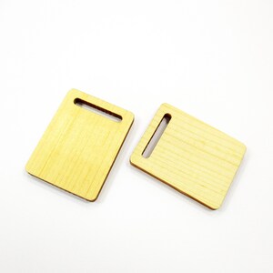 Pair of miniature 1:12 wooden cutting boards 30x23mm displayed on white background; ideal for dollhouse kitchen props.