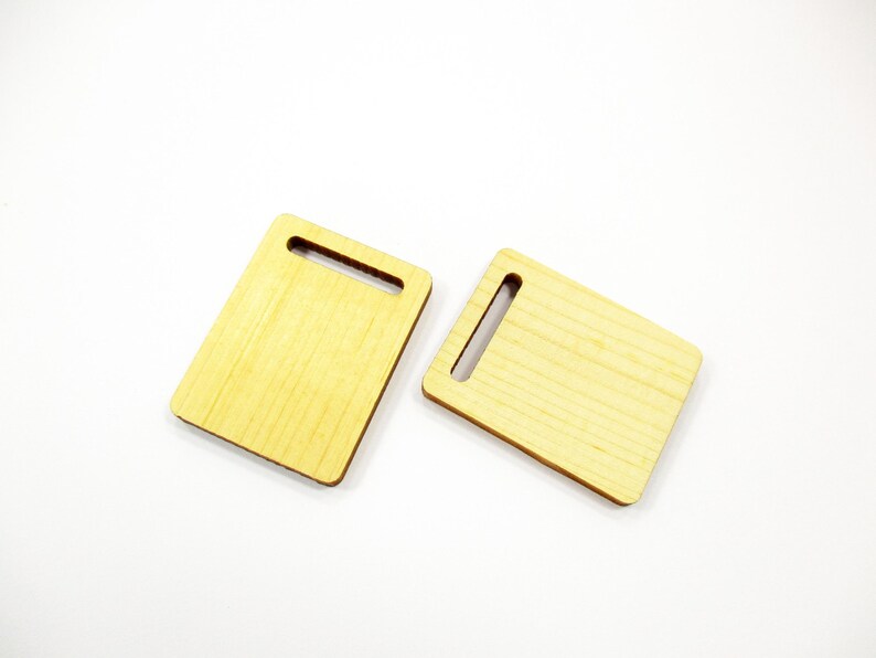 Pair of miniature 1:12 wooden cutting boards 30x23mm displayed on white background; ideal for dollhouse kitchen props.