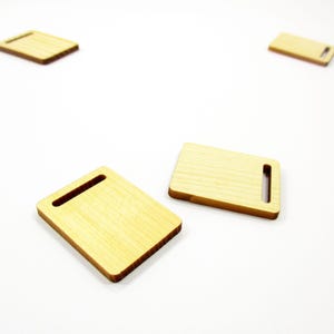 Set of two handcrafted 1:12 scale miniature rectangular wooden cutting boards, size 30x23mm, for dollhouse kitchen food prep.