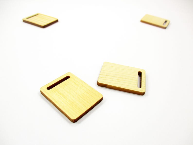 Set of two handcrafted 1:12 scale miniature rectangular wooden cutting boards, size 30x23mm, for dollhouse kitchen food prep.
