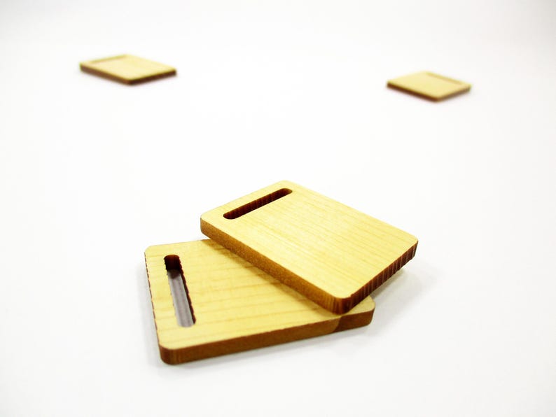 Two stacked handcrafted 1:12 scale miniature wooden boards, essential props for room box kitchen counters and miniature cafes.