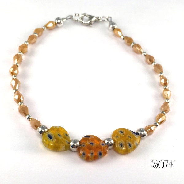 Coeurs millefiori jaune foncé entouré de perles empilement bracelet de larme facettes moutarde de cristaux