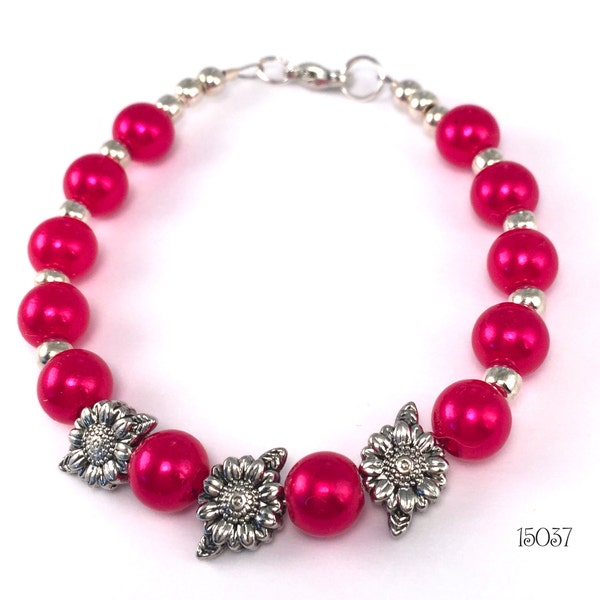 Bright lustrous burgundy 8mm glass pearls with antique silver tone sunflowers and shiny round metal beads stacking beaded bracelet