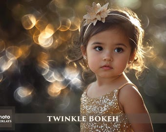 May include: A young girl with long brown hair is wearing a gold sparkly dress and a gold flower headband. The background is blurred with golden bokeh lights.