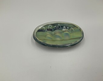 Oval fused glass soap dish in hues of gray, blue, brown, cream
