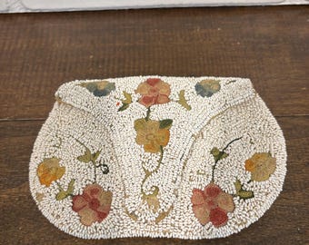 beautiful "SMALL" antique clutch purse is a stunning example of antique floral design