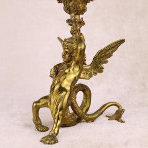Antique dragon child candlestick gilt brass bronze putto figural gryphon gargoyle chamberstick wing serpent cherub gothic ormolu ornate