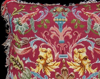 Huge antique pillow, mythological Northwind needlepoint with antique fringe and antique floral linen damask back, red yellow beige purple