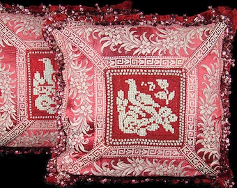 Pair antique pillows, Art Deco, glass beaded needlepoint silky soft satin jacquard red white floral garland Greek key pattern, tassels