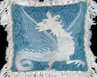 Old embroidered pillow, gothic gryphon griffin gargoyle dragon chimera, fringe tassels, blue ivory white, asian, middle eastern
