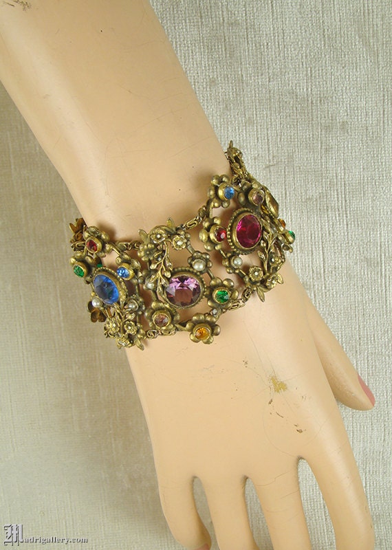 Antique brass floral filigree panel bracelet with 