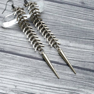 Silver spike and chain dangle earrings