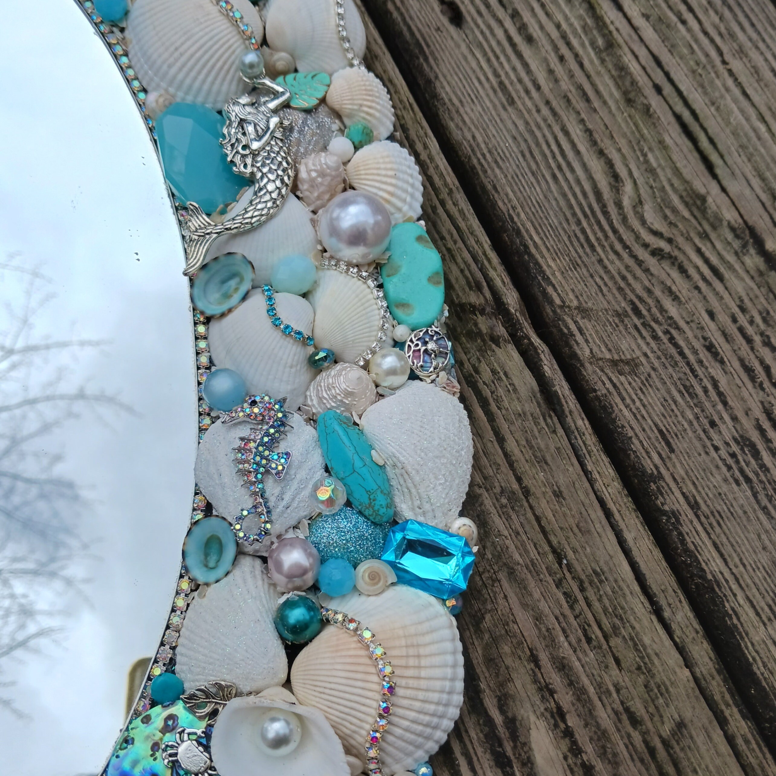 Shell Wall Mirror: Jeweled Brooches & Silver Mermaids