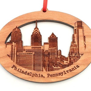 Philadelphia PA Skyline Oval Ornament - Engraved Philadelphia Pennsylvania Philly Downtown Black Cherry Wood Ornament - City Collection