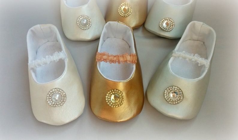 gold baby slippers
