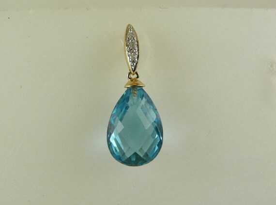 BlueTopaz 8.72ct Pendant 14k Yellow Gold and Diamonds 0.03ct