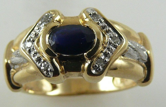 Sapphire Ring 0.60ct 14k Yellow Gold and Diamonds 0.06ct