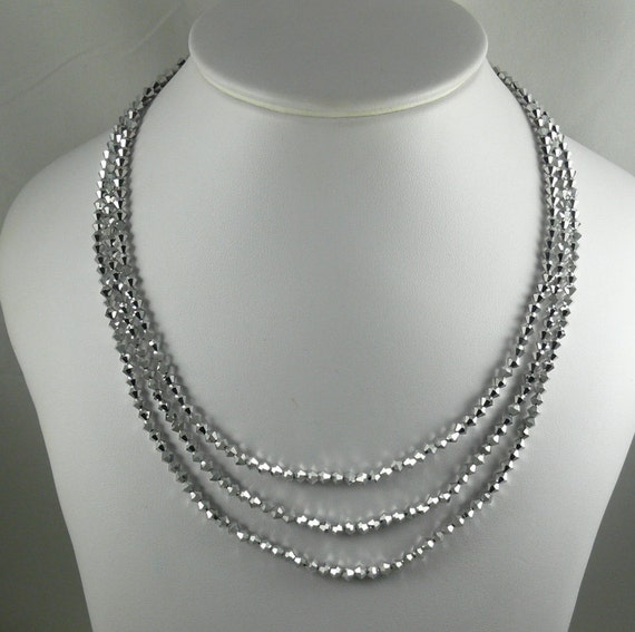 Comet Double Coated Crystal Triple Strand Necklace with Silver Clasp 18.5 Inches