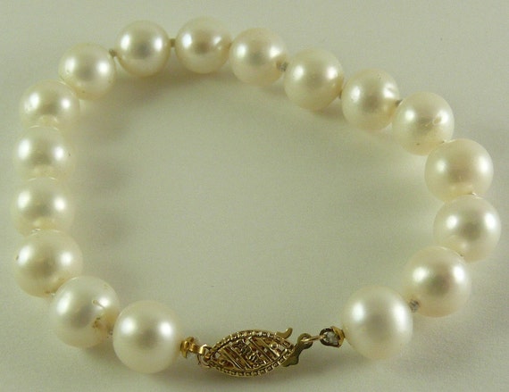 Freshwater Pearl 8.5 mm - 9.1 mm Bracelet 14k Yellow Gold Fish Locks 7 1/4"