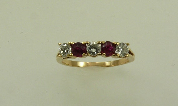 Ruby 0.25ct Ring with Diamonds 14k Yellow Gold