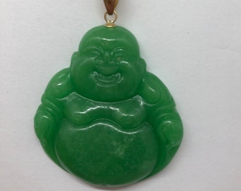 May include: A green jade pendant of a smiling Buddha, with a gold bail.
