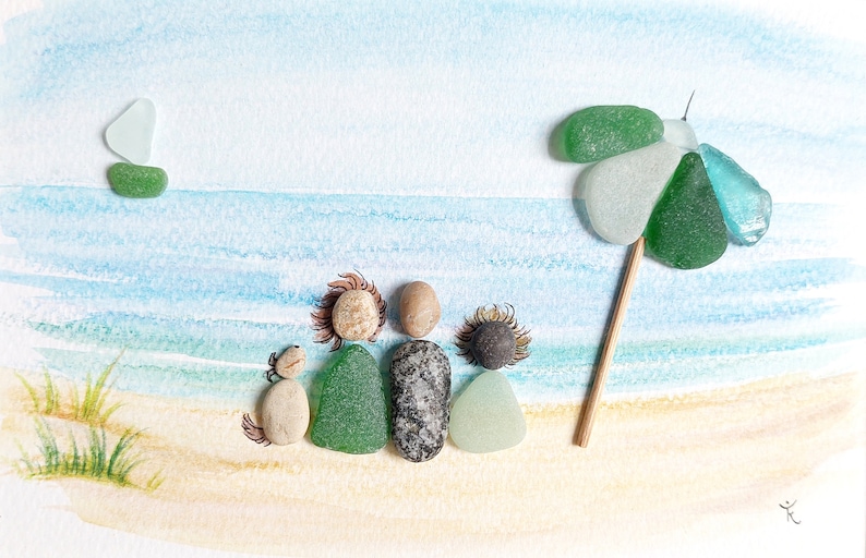 May include: A watercolor painting of a beach scene with a family of five made from sea glass and stones. The family is standing under a green and blue sea glass umbrella.
