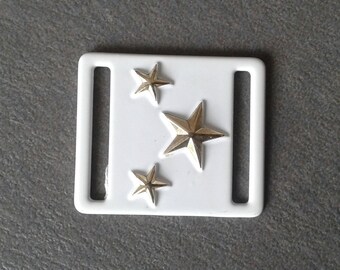 Accessory white metal and gold stars